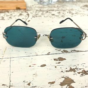Classic rimless Cartier sunglasses.